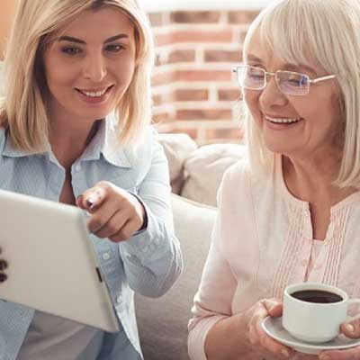 Woman helping with tablet